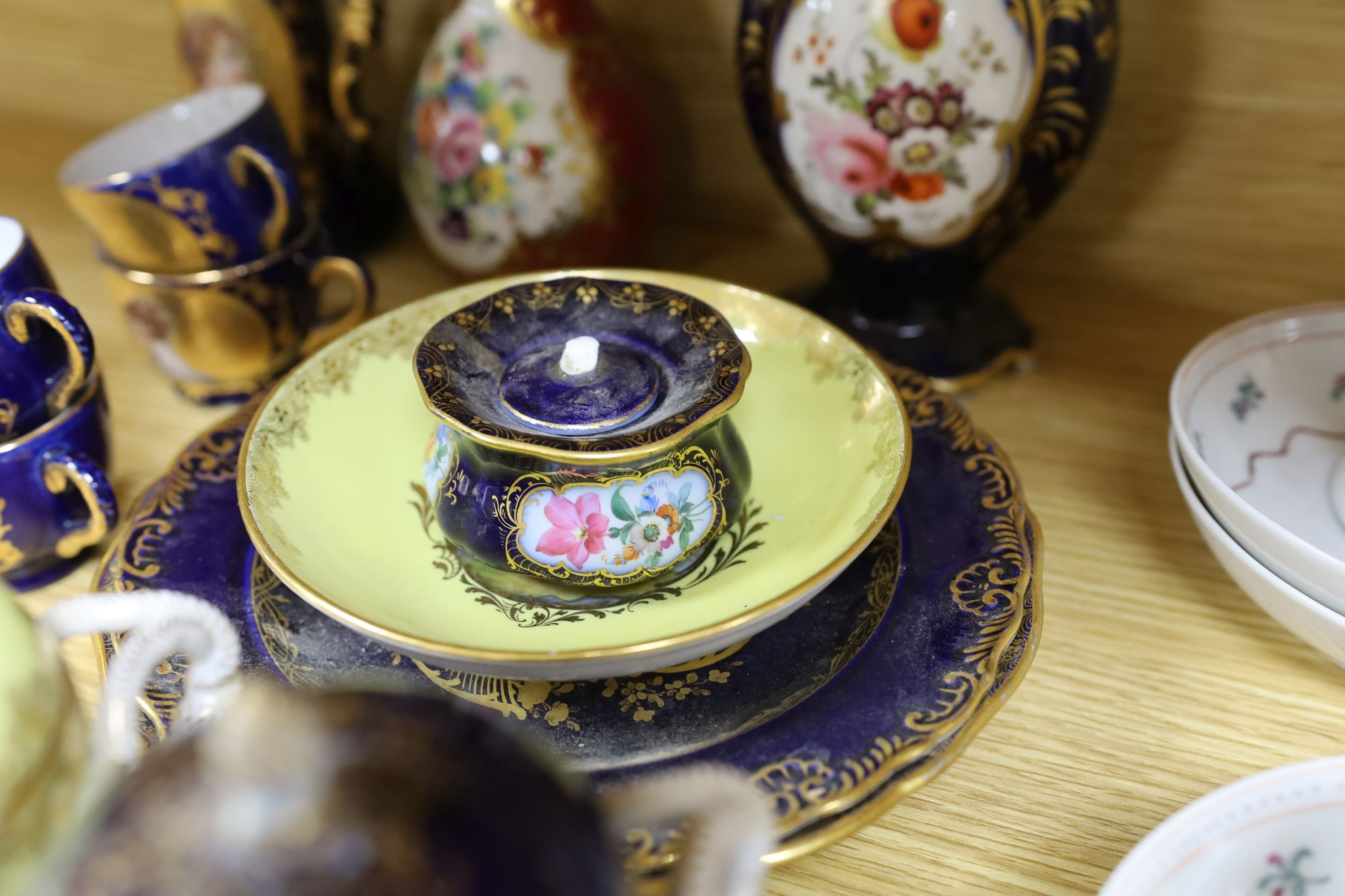 A selection of 19th century porcelain including Meissen cups, covers and saucers, Newhall type bowls and saucers and others